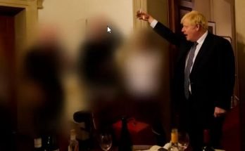 Johnson cheersing with a glass during an illegal lockdown gathering in Downing Street