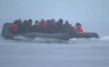 Migrants and Asylum Seekers in a small dingy in the Channel
