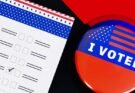 A Ballot paper and a badge saying "I voted" with an American flag on it